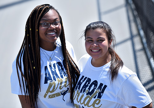Two female students wearing Akron Pride t-shirts