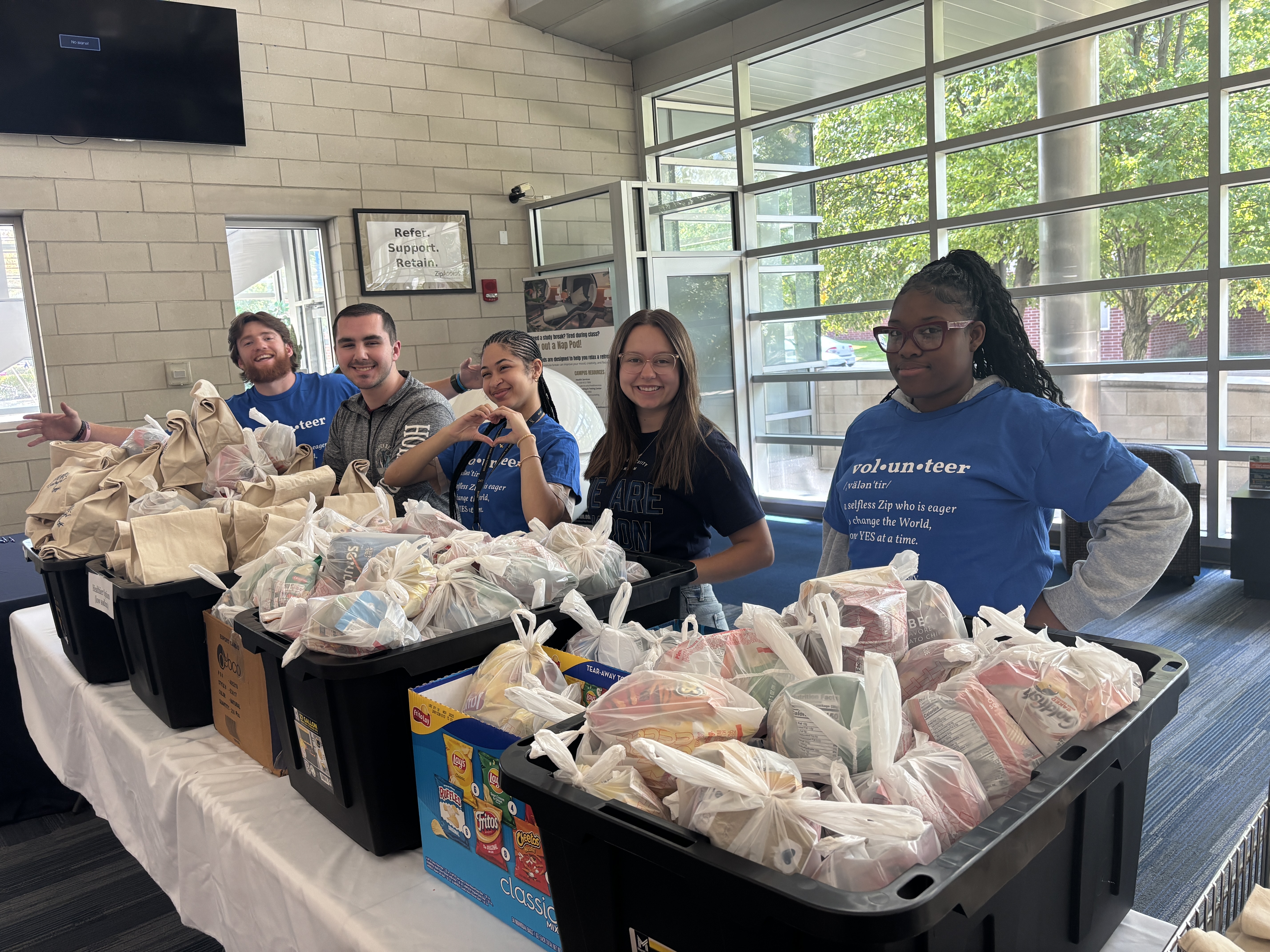 Zips support their fellow students by volunteering in the Campus Cupboard
