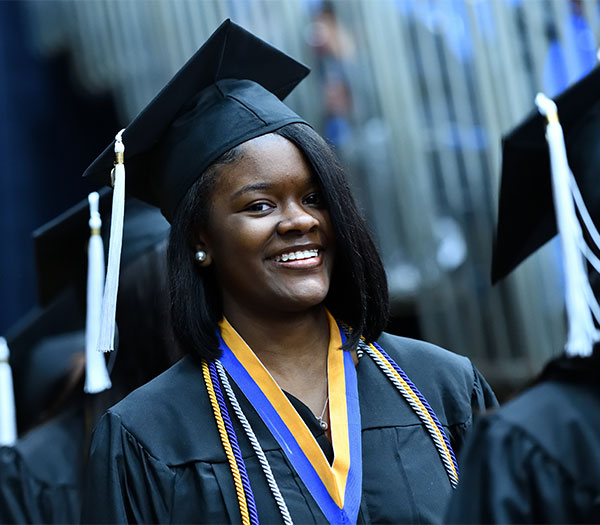 University of Akron student at graduation ceremony