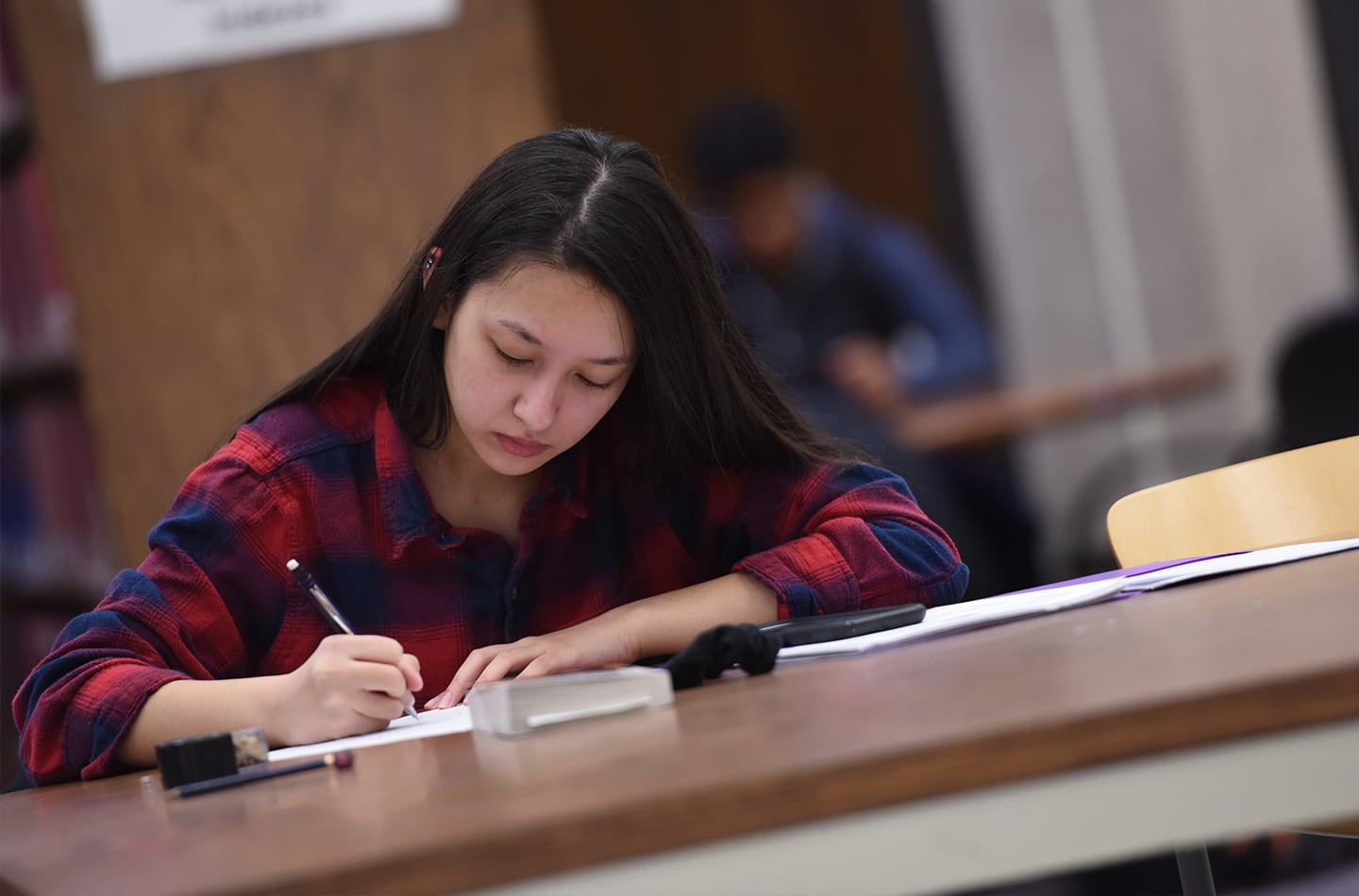 A student studying in the library