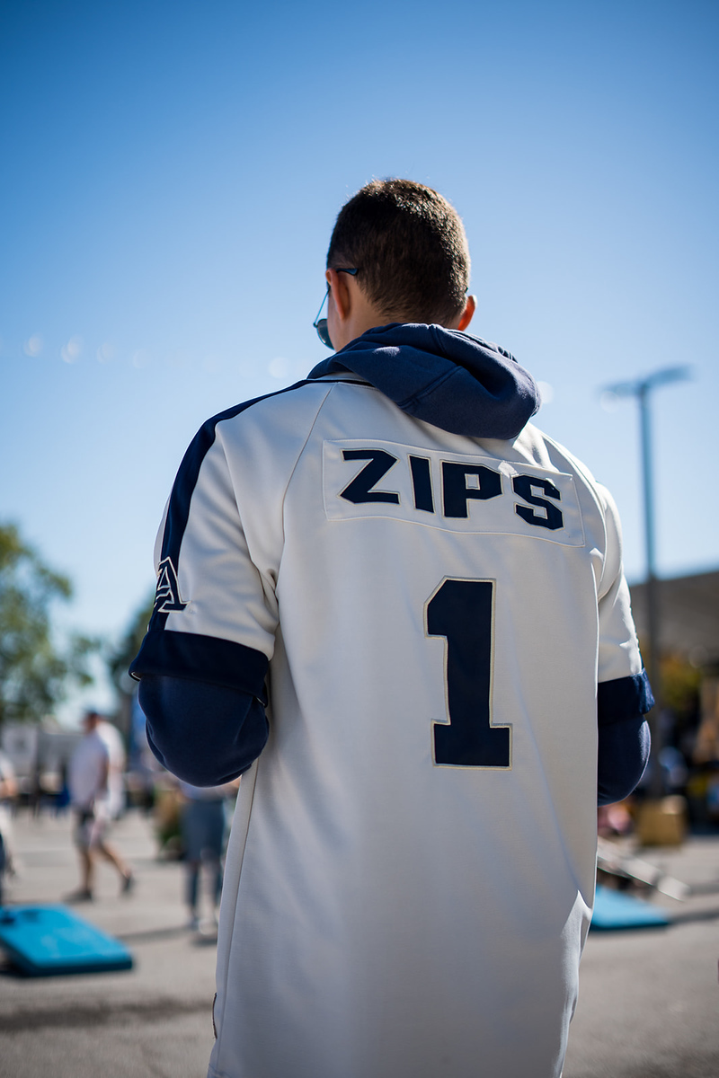 Student wearing a Zips athletic jersey