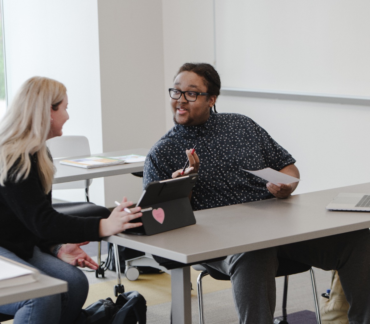 Students conversing in classroom