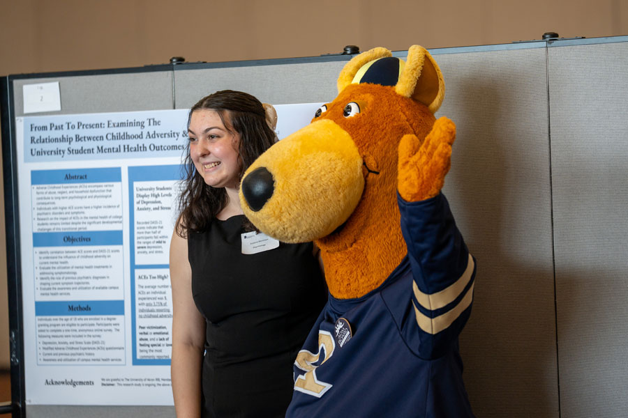 Student and Zippy smiling