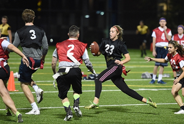 students playing flag football intramural game