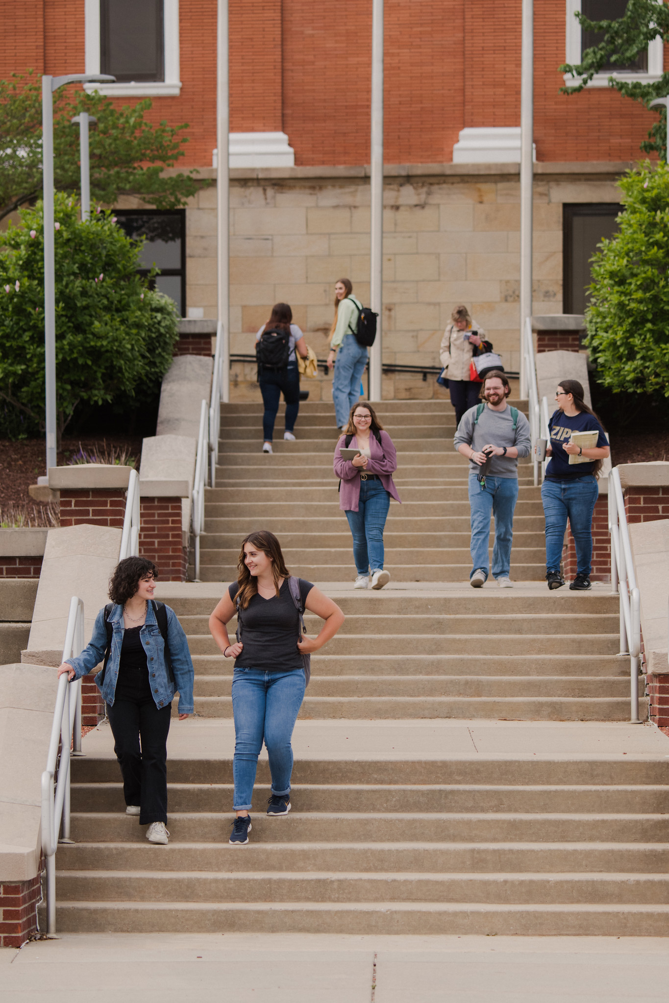 Image of students walking through campus