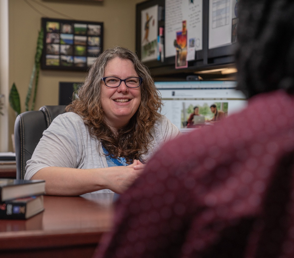 Advisor talking with student