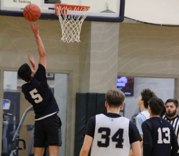 Students playing intramural basketball