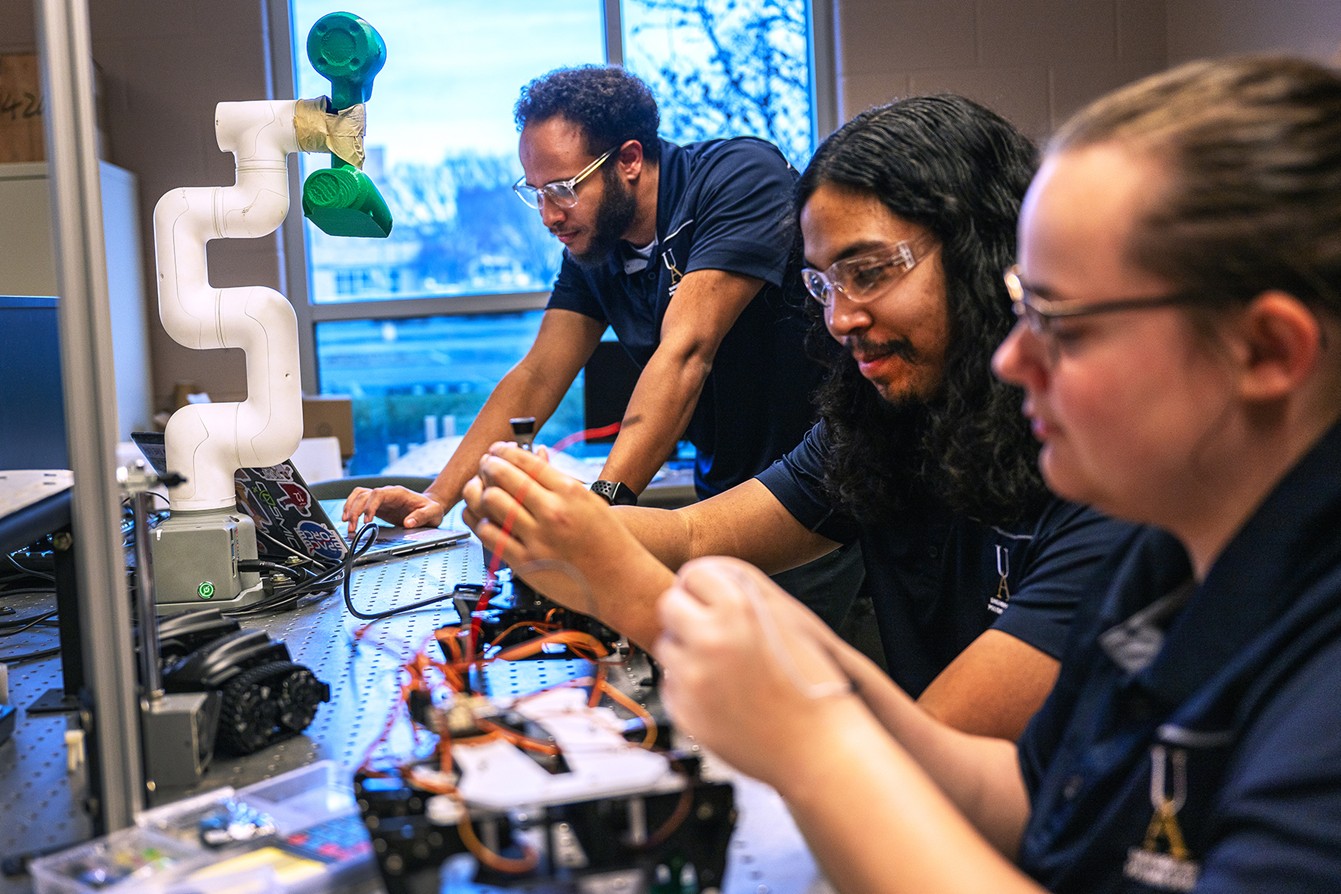 Students working in an electronics lab
