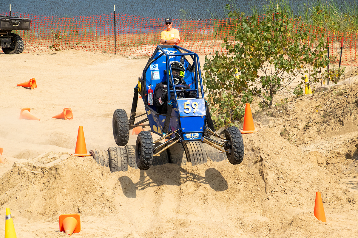 ZB24 catches some air while performing in the Suspension and Traction course.