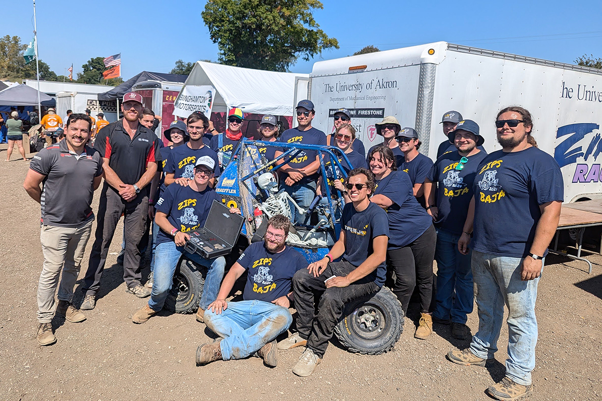 Zips Baja Racing Team receiving an award from representatives of the Gene Haas Foundation.