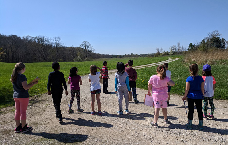 Students experiencing outdoor education opportunities at the Field Station.