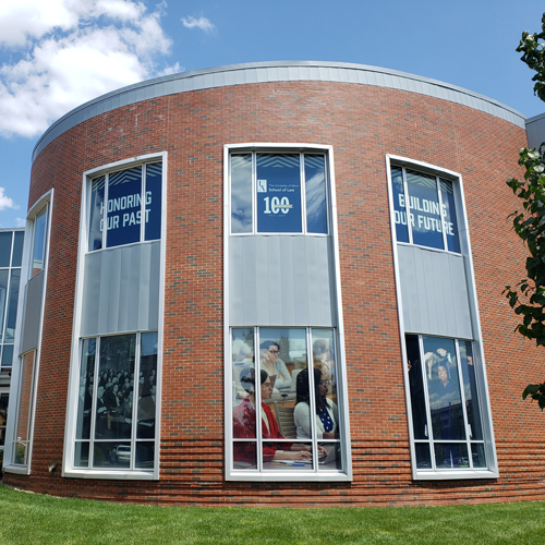 Akron Law centennial celebration banners around campus.